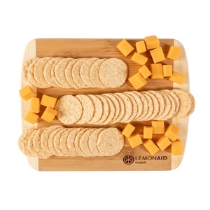 Photo of Board With Cheese And Crackers