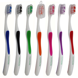 Photo of Toothbrush With Tongue Scraper