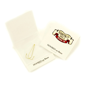 Photo of Two Gold Plated Fishing Hooks In Matchbook