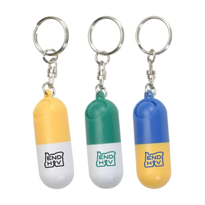 Photo of Capsule Shaped Pill Box With Key Ring