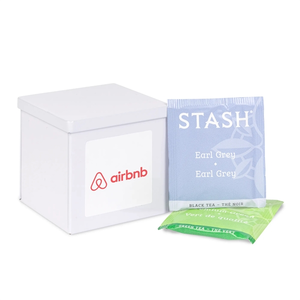 Photo of White Canister With Label Filled With Stash Tea Assortment