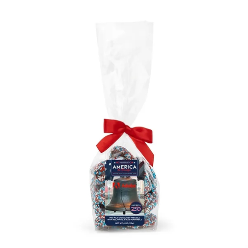 Main photo of America 250 Mug Drop  Patriotic Milk Choc Nonpareil Pretzels