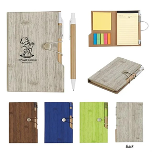 Photo of Compact Notebook With Neon Colored Sticky Notes Inside